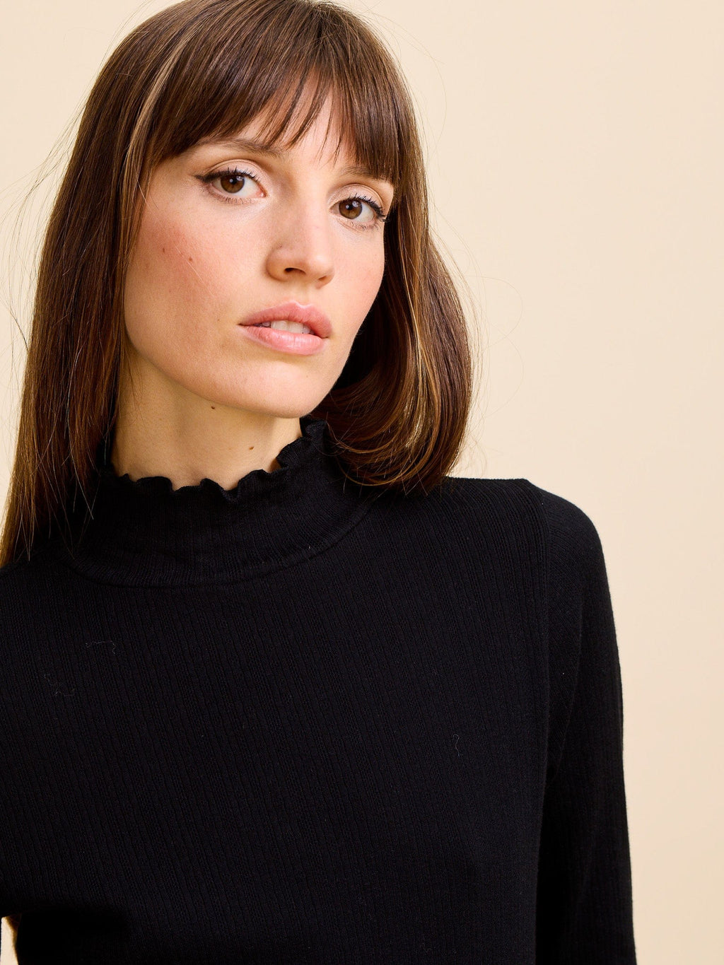 Carmela Pointelle Turtleneck in Black